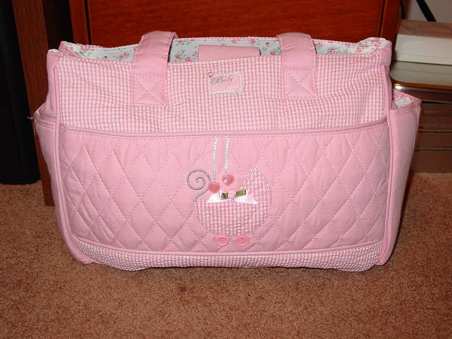 Pink quilted diaper bag